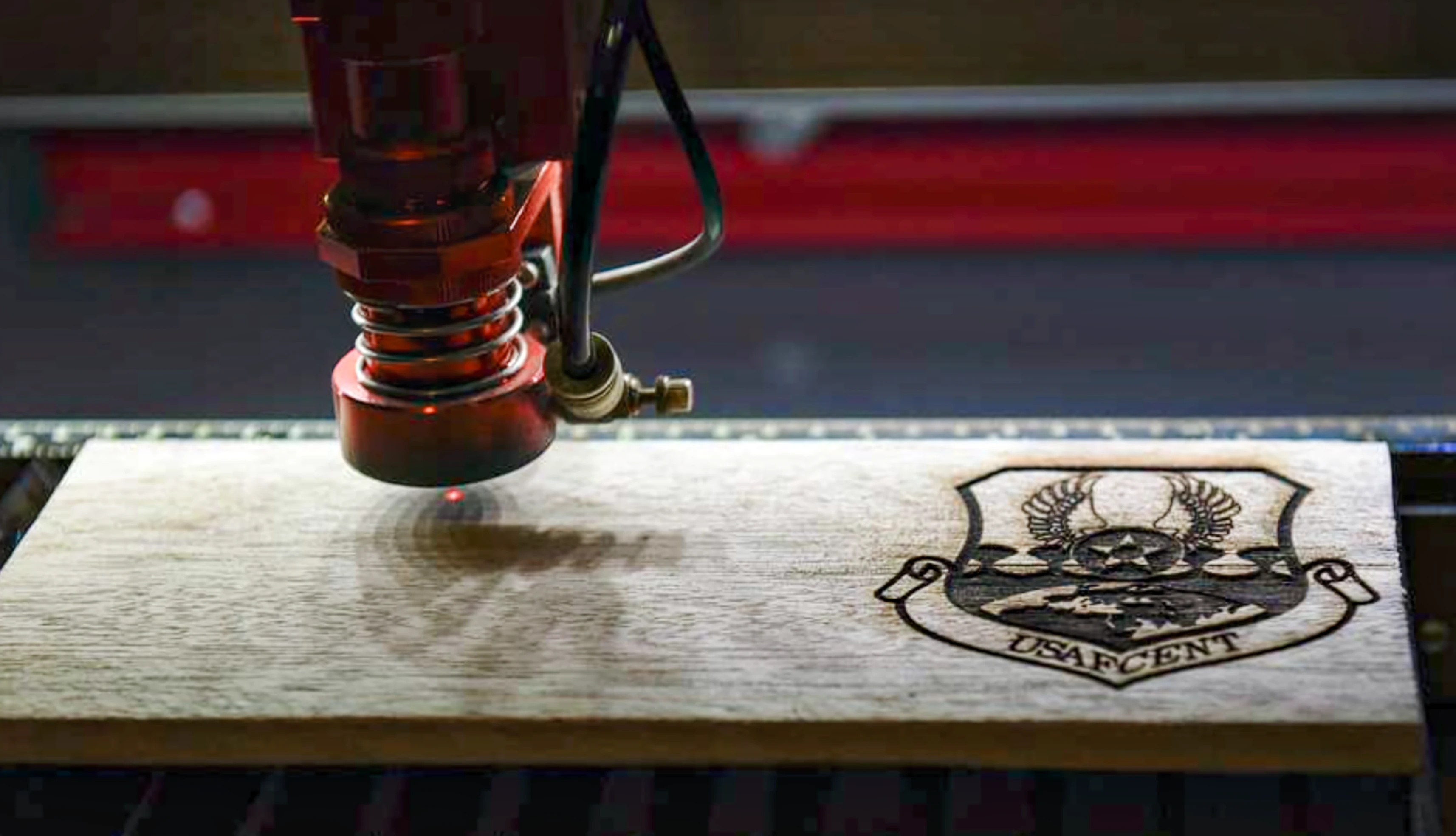 Laser-engraved design on wood — the crisp, dark contrast shows what a well-calibrated diode laser achieves on a light-coloured surface like basswood